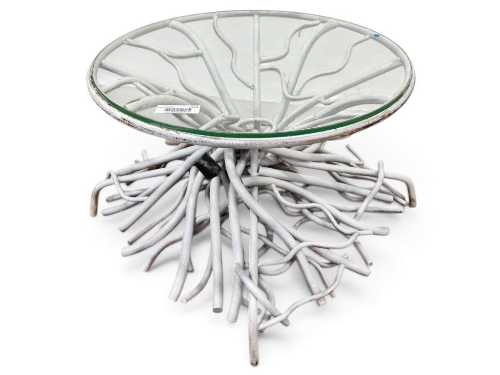 Palm Beach Regency faux coral wrought iron table: Palm Beach Regency faux coral wrought iron table. Approx. 30 x 30 x 16 inches.