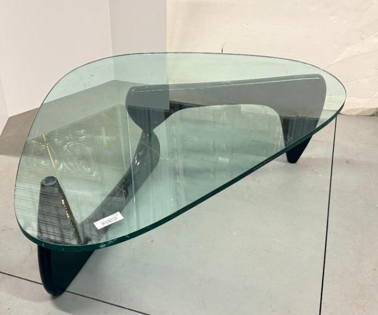 Herman Miller Noguchi Coffee Table: Herman Miller Noguchi Coffee Table. Approx. 50 x 36 x 16 inches. Glass approx. 3/4 inch thick.
