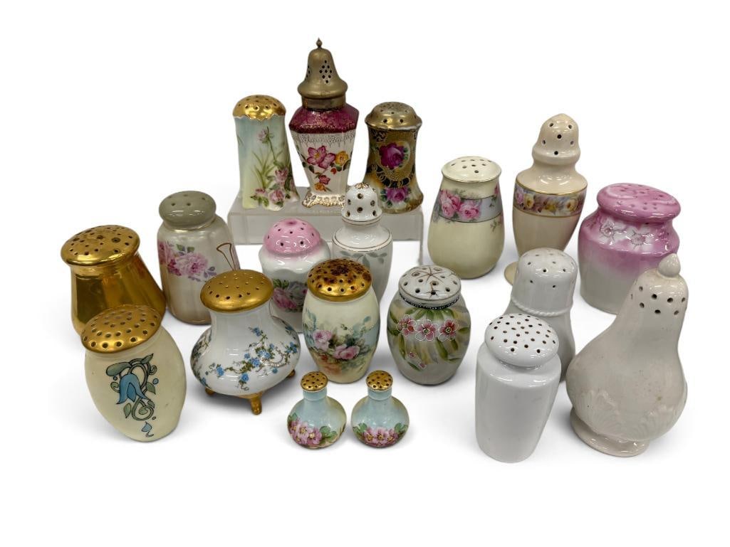 Porcelain Sugar Shakers: Porcelain Sugar Shakers. 19 pieces. Tallest approx. 7 inches.