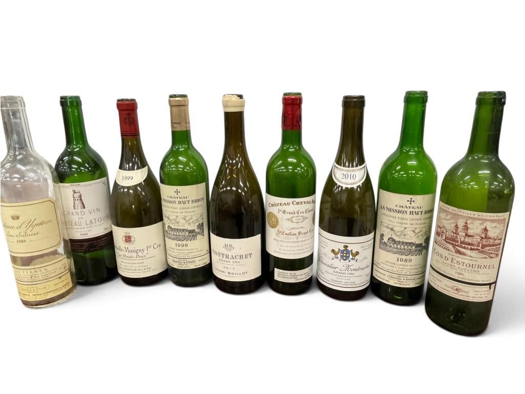 9 Empty Wine Bottles: 9 Empty Wine Bottles. Including Chateau La Mission Haut Brion, Chateau Cheval Blanc, Montrachet Gran Cru and more.
