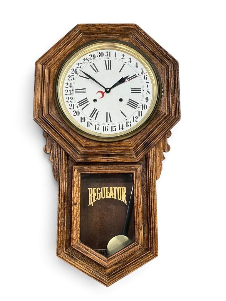 Heydan Trapani Oak case wall clock: Heydan Trapani Oak case wall clock. Approx. 32 x 18 x 5 inches.
