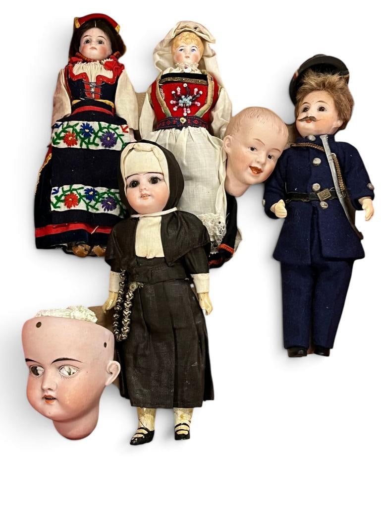 Ethnic Dolls, Nun and doll heads: Ethnic Dolls, Nun and doll heads. 6 pieces. Tallest approx. 8 inches.