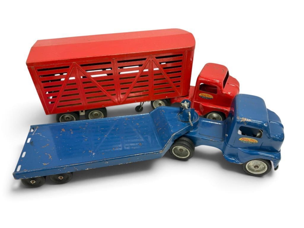2 Tonka Toys Metal Trucks: 2 Tonka Toys Metal Trucks. Approx. 23 inches long.