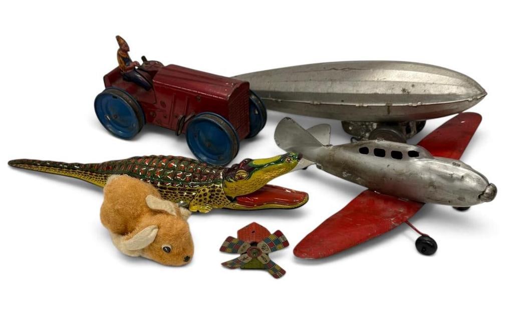 Wind Up toys, Marx Airplane and more: Wind Up toys, Marx Airplane and more. 6 pieces. Zeppelin approx. 16 inches.