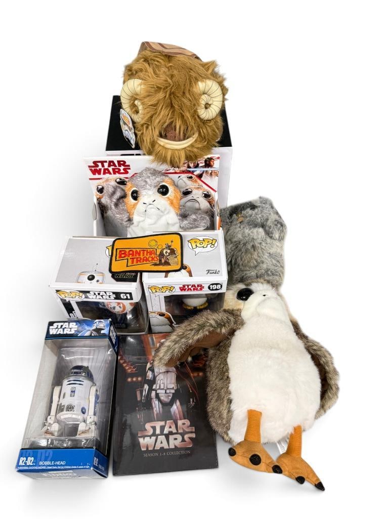 Star Wars Toys etc.: Star Wars Funkos, Porgs, R2D2 Funko, Wampa Cave Snow Globe, Bantha Tracks patch and more. 10 pieces.
