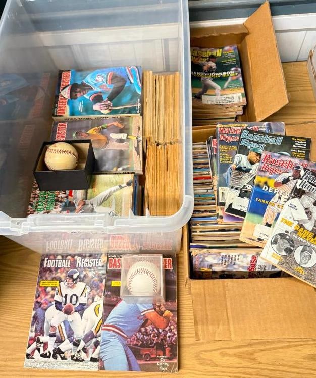 1970's Baseball / Football Registers and more: 1970's Baseball / Football Registers, Baseball Digest, Brooks Robinson autographed ball and 1994 World Series Ball.