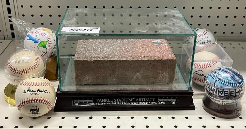 Monument Park Brick from Yankee Stadium: Monument Park Brick from Yankee Stadium with COA. and 6 baseballs.