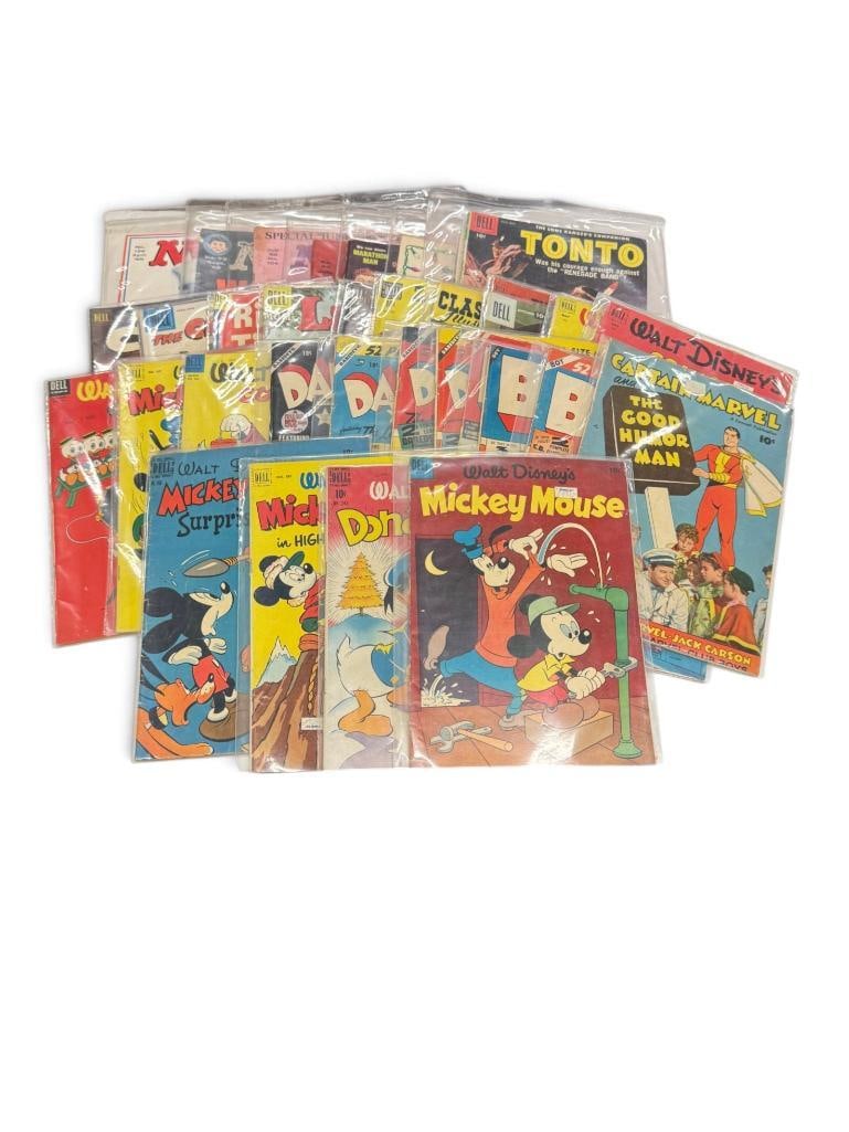 Vintage Comic Books and Mad Magazines: Vintage Comic Books and Mad Magazines. Approx. 34 books. Including Captain Marvel, Dell, Walt Disney and more.