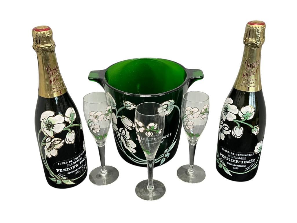 Perrier-Jouet 1983 Champagne bottles, ice bucket and glasses: Perrier-Jouet 1983 Champagne bottles, ice bucket and glasses. 6 pieces. Bottle approx. 13 x 3.5 x 3.5 inches.