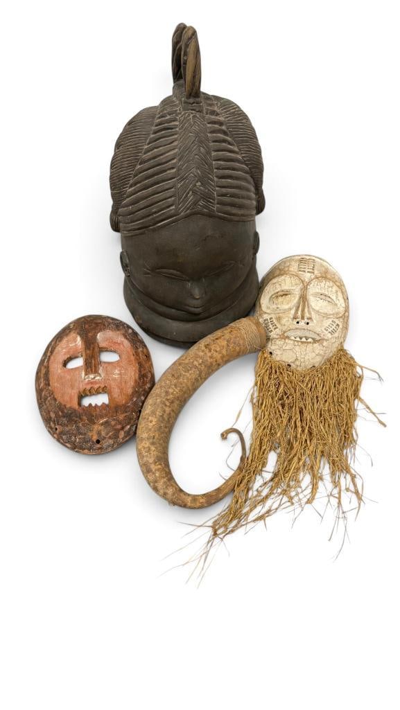 African carved masks, helmet and more (1 of 13)