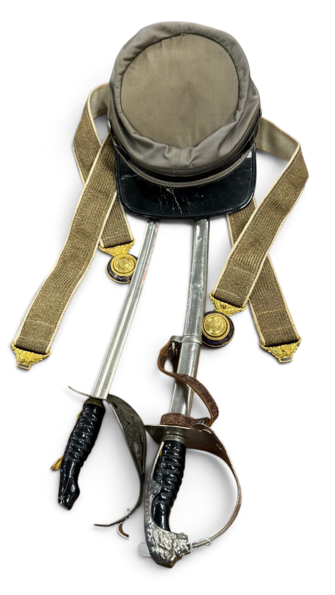 Toy swords, kepi and belts: Toy swords, kepi and belts. 5 pieces.
