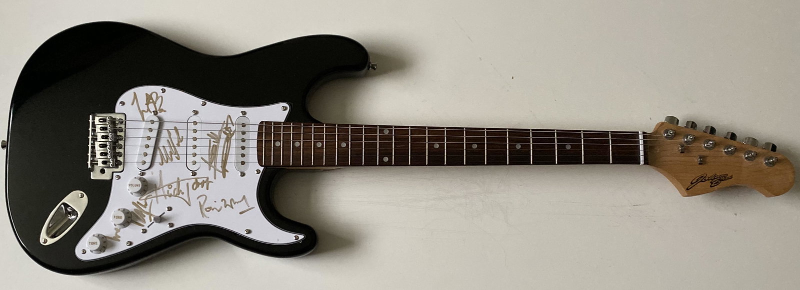 The Rolling Stones Electric Guitar Signed by 6: This lot is an electric guitar autographed by Mick Jagger, Keith Richards, Ronnie Wood, Charlie Watts, Bill Wyman and Mick Taylor of The Rolling Stones. Item comes with a Certificate of Authenticity g