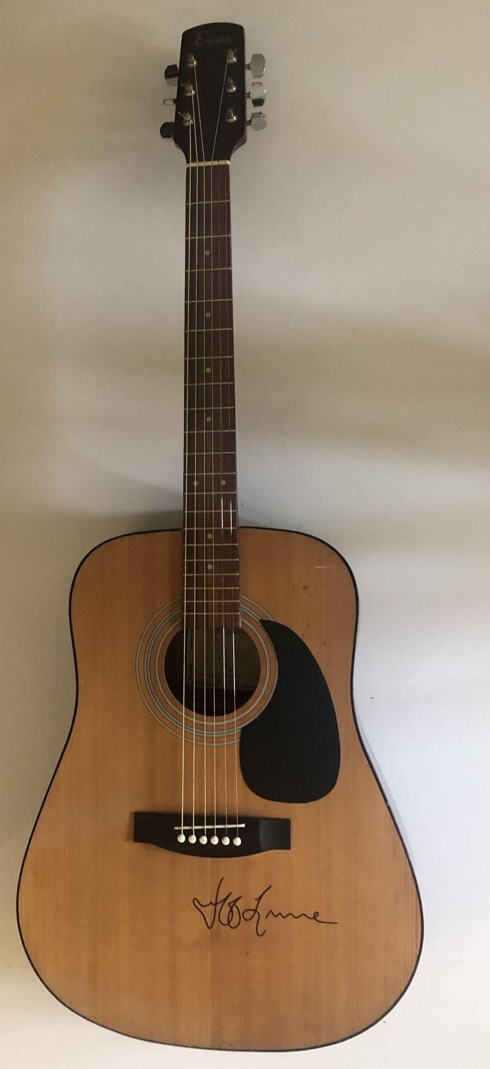 Jeff Lynne ELO Signed Acoustic Guitar Certified: This lot is an acoustic guitar autographed Jeff Lynne of ELO. Item comes with Certificate of Authenticity guaranteeing it for a lifetime. Item comes with photos from exact time of signing. All items w