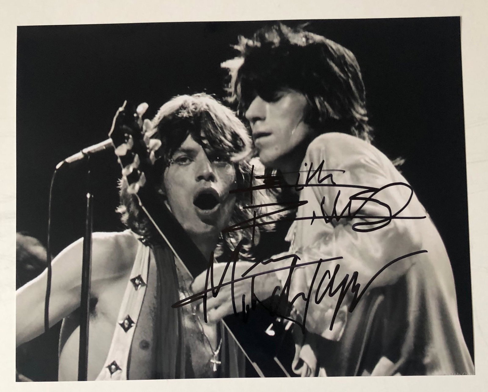 Jagger and Richards Signed 8 x 10” Photograph Certified: This lot is a photograph autographed by Mick Jagger and Keith Richards of The Rolling Stones. Item comes with Certificate of Authenticity guaranteeing it for a lifetime. Item comes with time and place