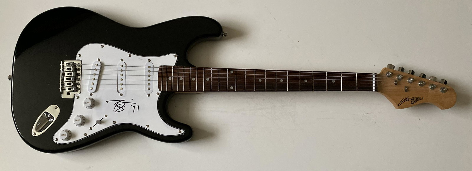 David Bowie Signed Electric Guitar Certified: This lot is an electric guitar autographed by David Bowie. Item comes with Certificate of Authenticity guaranteeing it for a lifetime. Item comes with time and place of signing details.