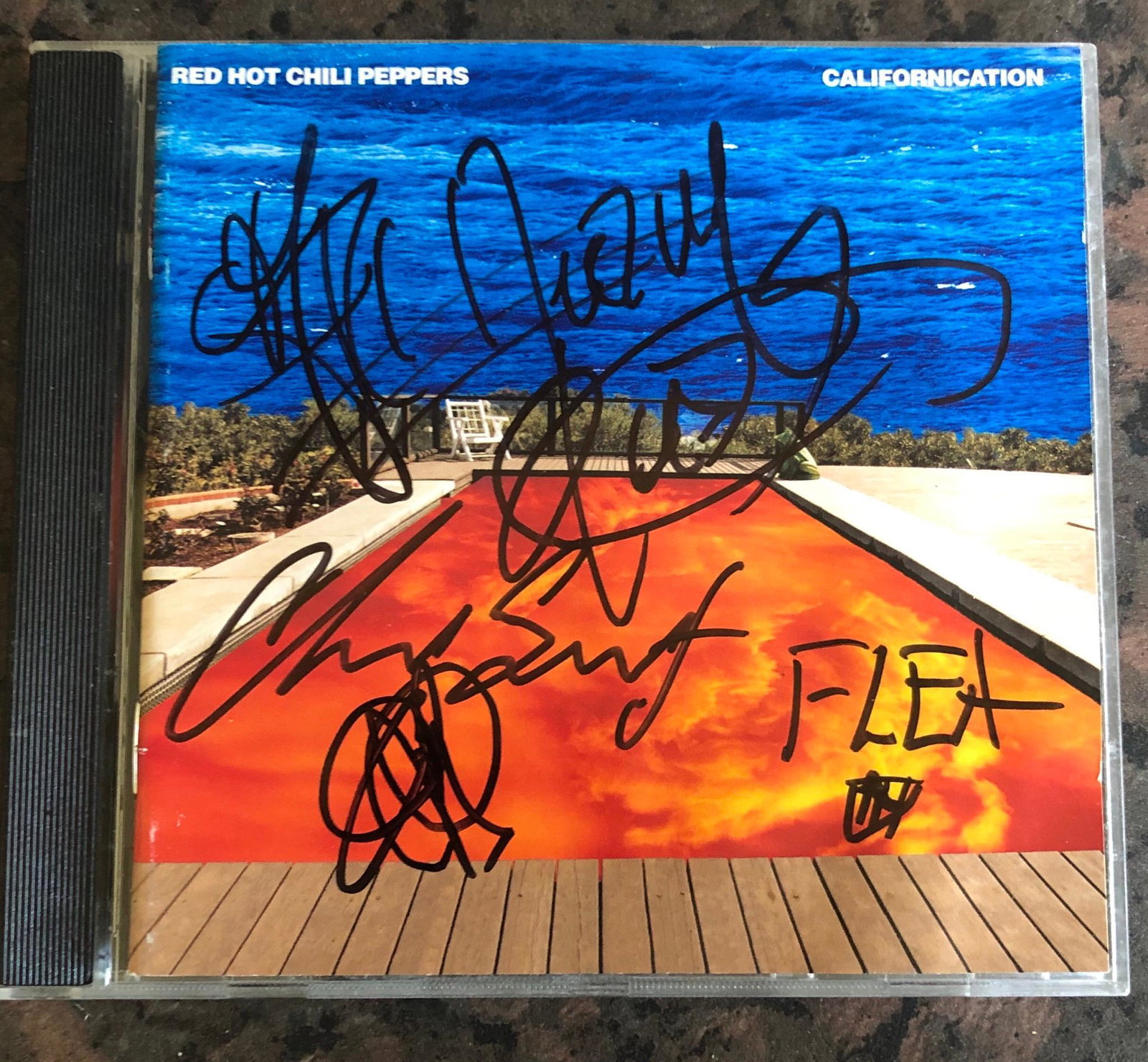 Red Hot Chili Peppers RHCP Fully Signed Californication: This lot is a CD autographed by all members of The Red Hot Chili Peppers. Item comes with Certificate of Authenticity guaranteeing it for a lifetime. Item comes with time and place of signing details.