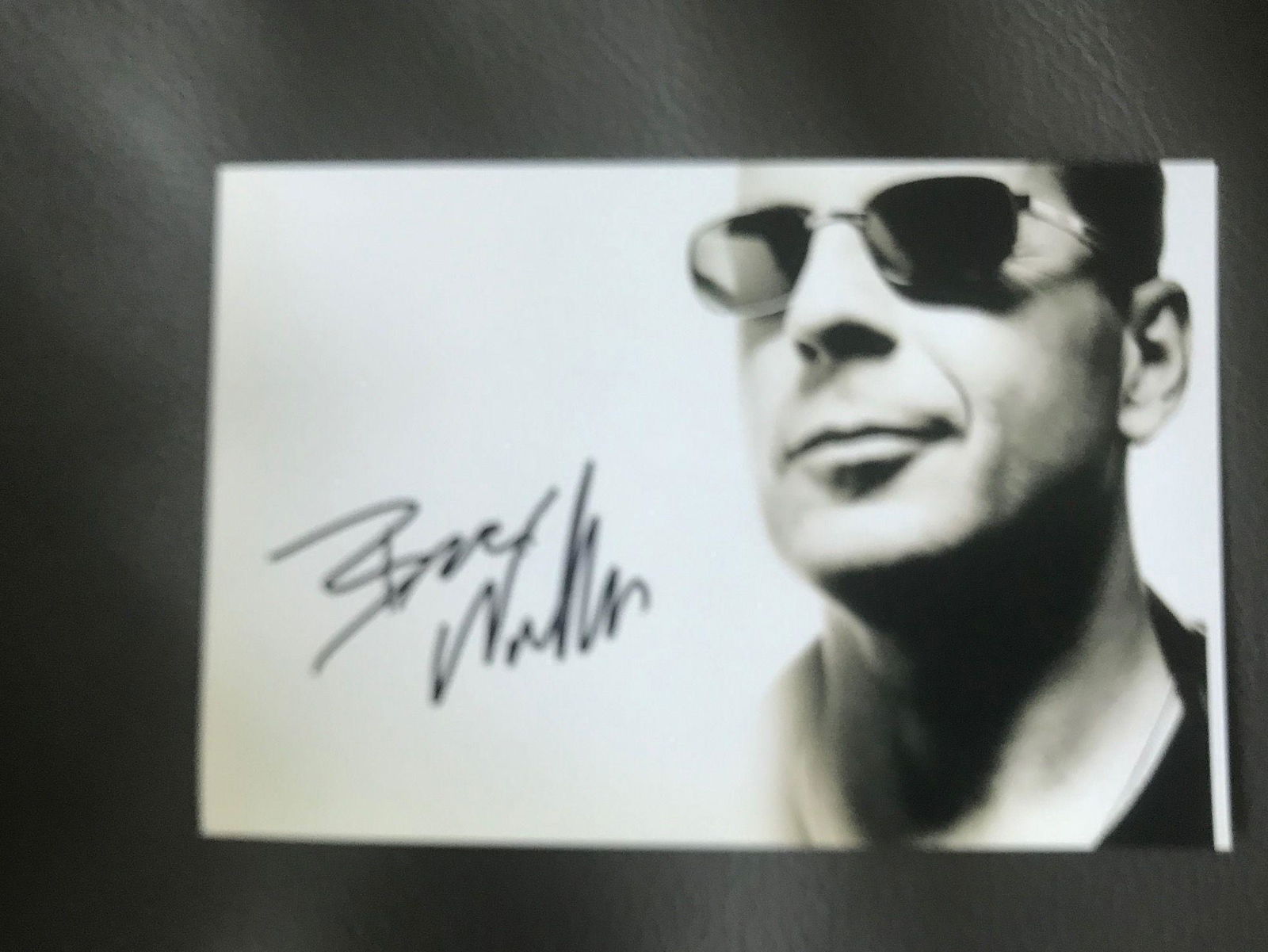 Bruce Willis Signed Photograph Certified: This lot is a photograph, autographed by Bruce Willis