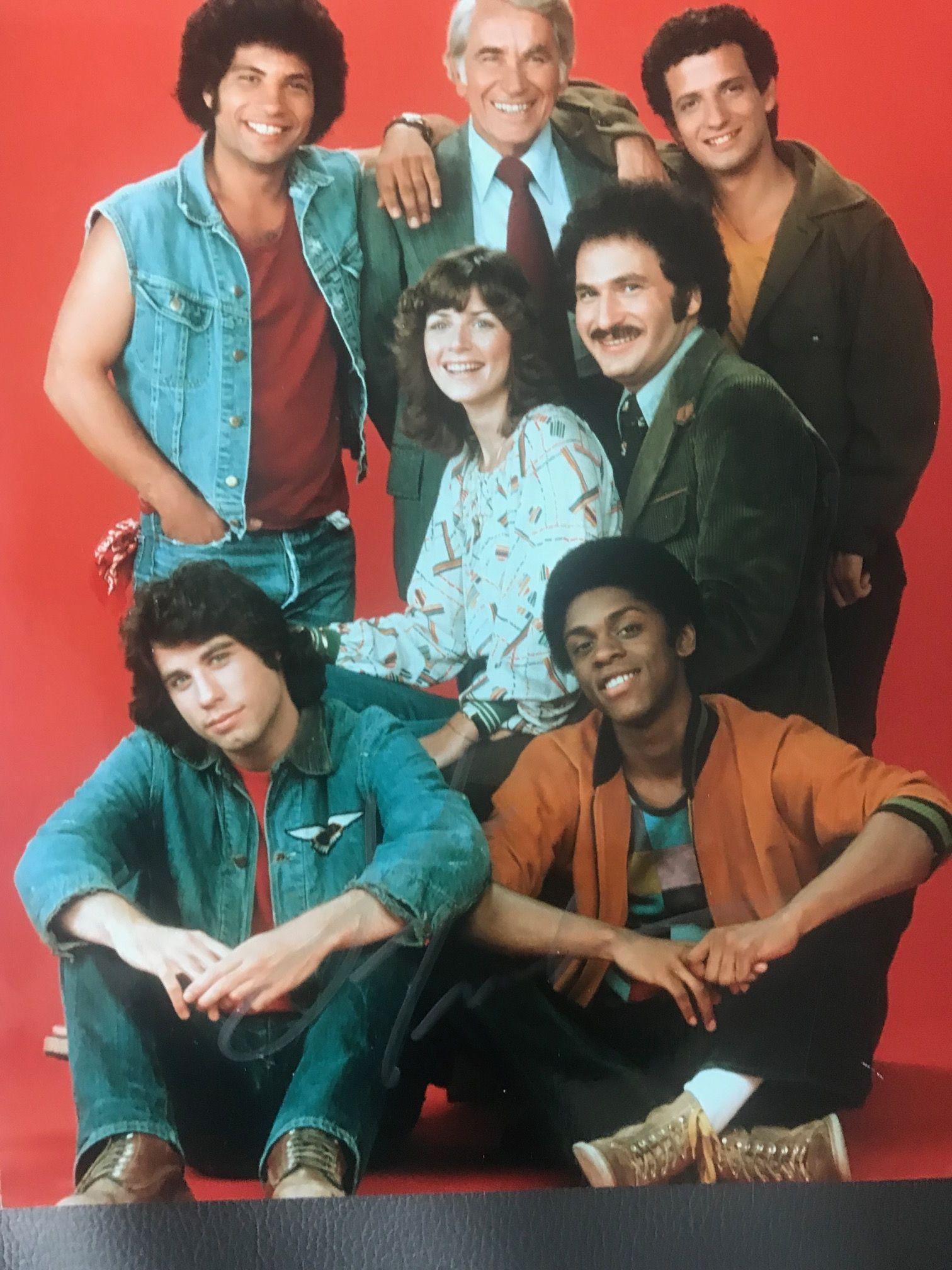 John Travolta Signed Welcome Back Kotter Photograph: This lot is a photograph autographed by John Travolta. Item comes with Certificate of Authenticity guaranteeing it for a lifetime.