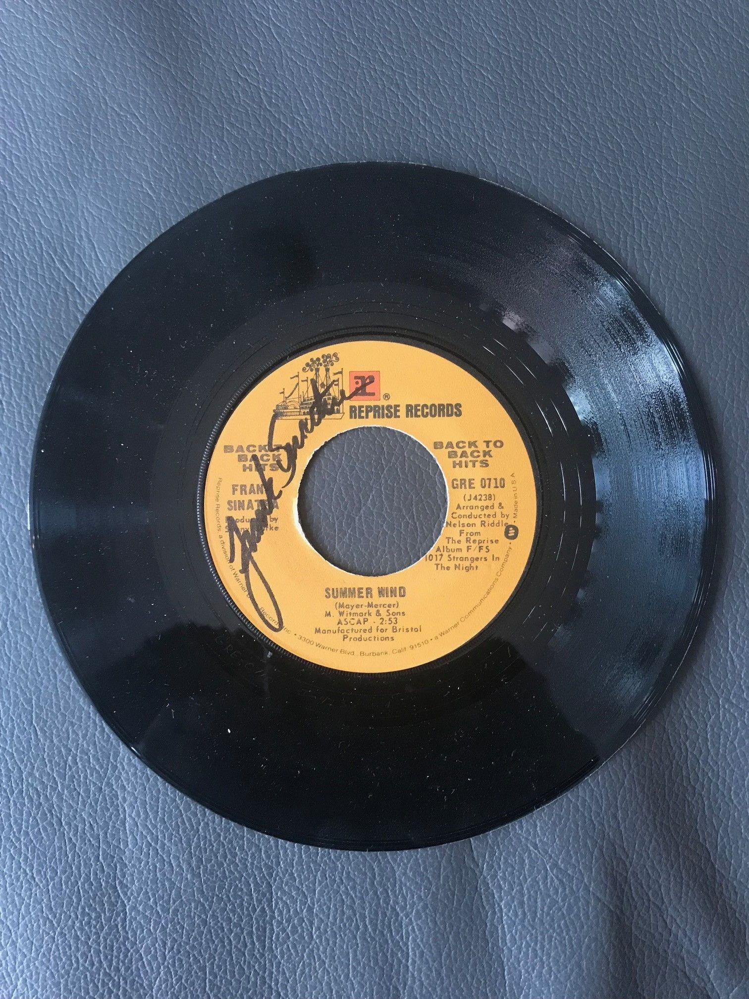 Frank Sinatra Signed Summer Wind 45 Vinyl Single: This lot is a 45 Vinyl (Summer Wind) autographed by Frank Sinatra. Item comes with Certificate of Authenticity guaranteeing it for a lifetime