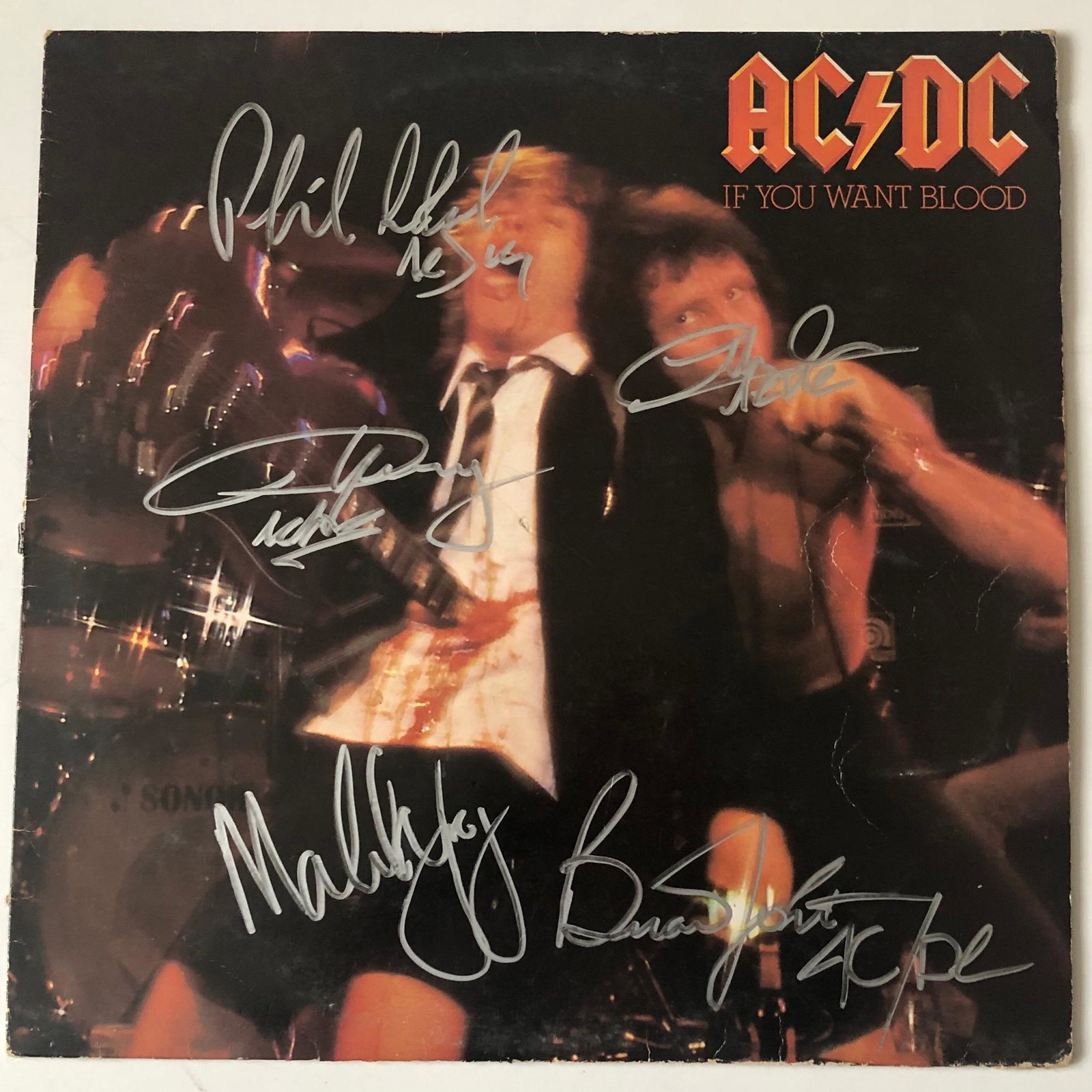 AC/DC Fully Signed If You Want Blood Vinyl LP Certified: This lot is a vinyl LP autographed by Brian Johnson, Angus Young, Malcolm Young, Cliff Williams and Phil Rudd of AC/DC. Item comes with Certificate of Authenticity guaranteeing it for a lifetime. Item