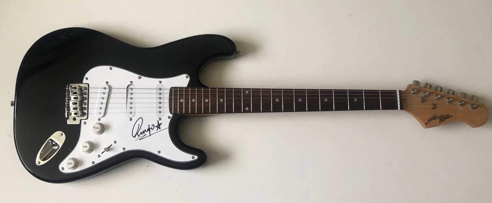 Ringo Starr The Beatles Signed Electric Guitar: This lot is an electric guitar autographed by Ringo Starr. Item comes with Certificate of Authenticity guaranteeing it for a lifetime