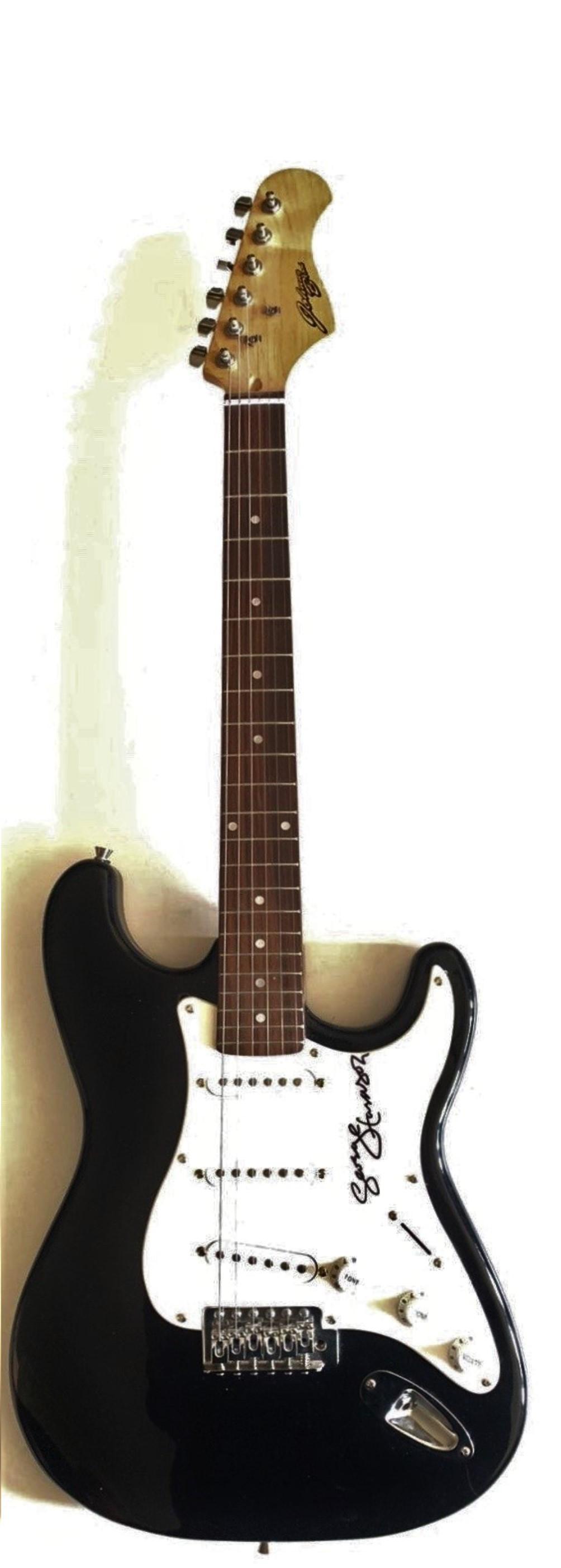 George Harrison The Beatles Signed Electric Guitar: This lot is an electric guitar autographed by George Harrison. Item comes with Certificate of Authenticity guaranteeing it for a lifetime