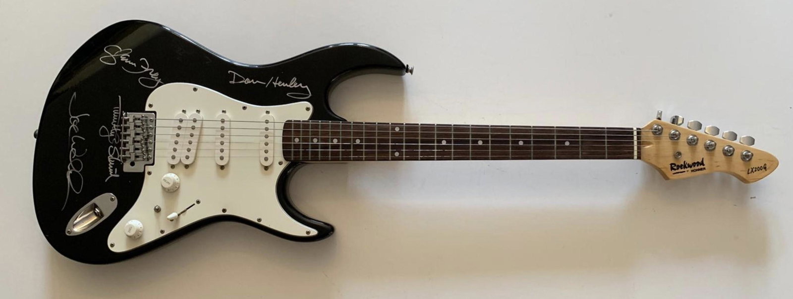 The Eagles Signed Electric Guitar Certified: This lot is an electric guitar autographed on the body by Joe Walsh, Timothy B Schmit, Glenn Frey and Don Henley of The Eagles. Item comes with Certificate of Authenticity guaranteeing it for a lifeti