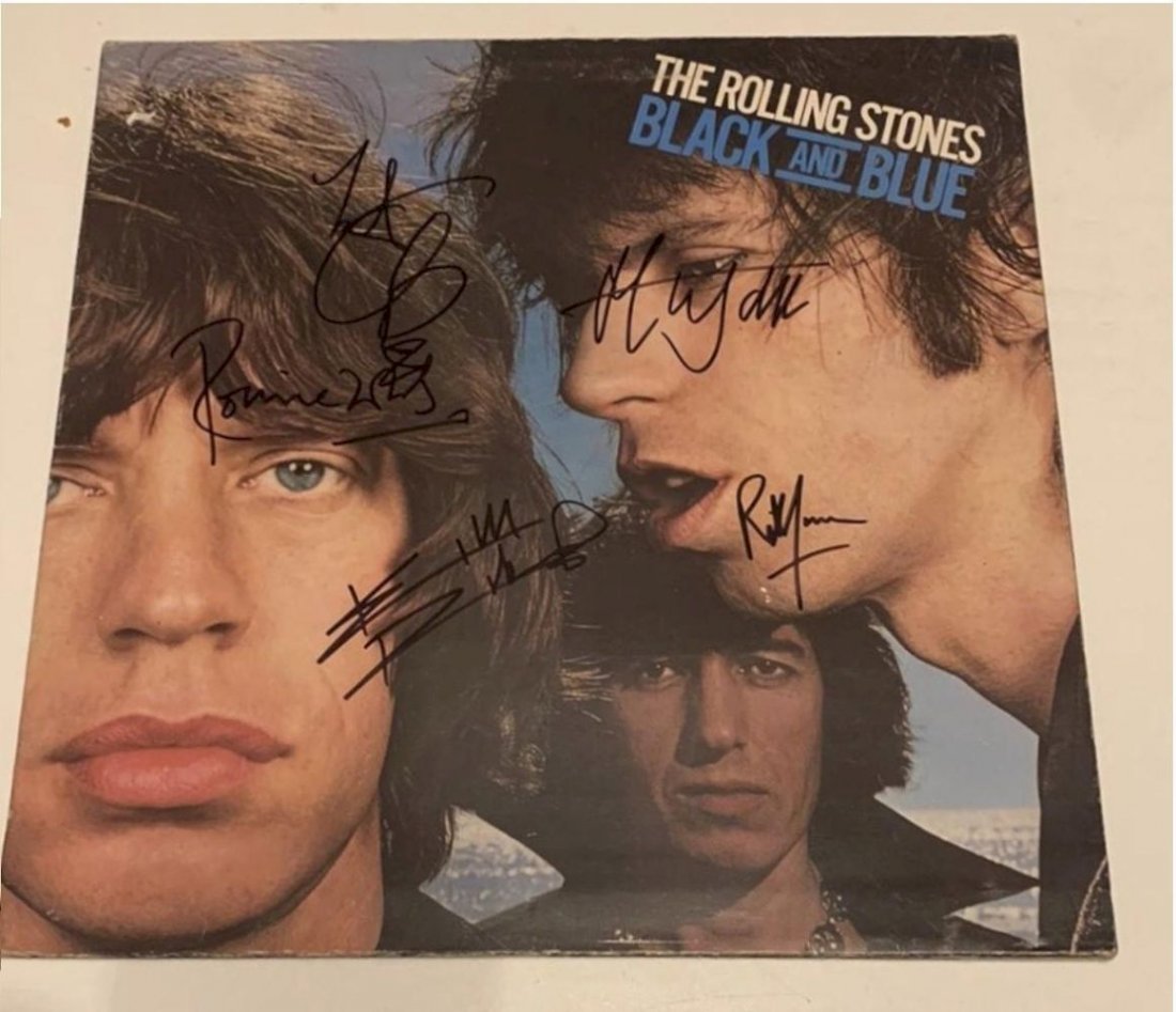Rolling Stones Signed Vinyl LP 35: This lot is a vinyl LP (Black and Blue) autographed by Mick Jagger, Keith Richards, Ronnie Wood, Charlie Watts and Bill Wyman of the Rolling Stones. Item comes with Certificate of Authenticity guarant