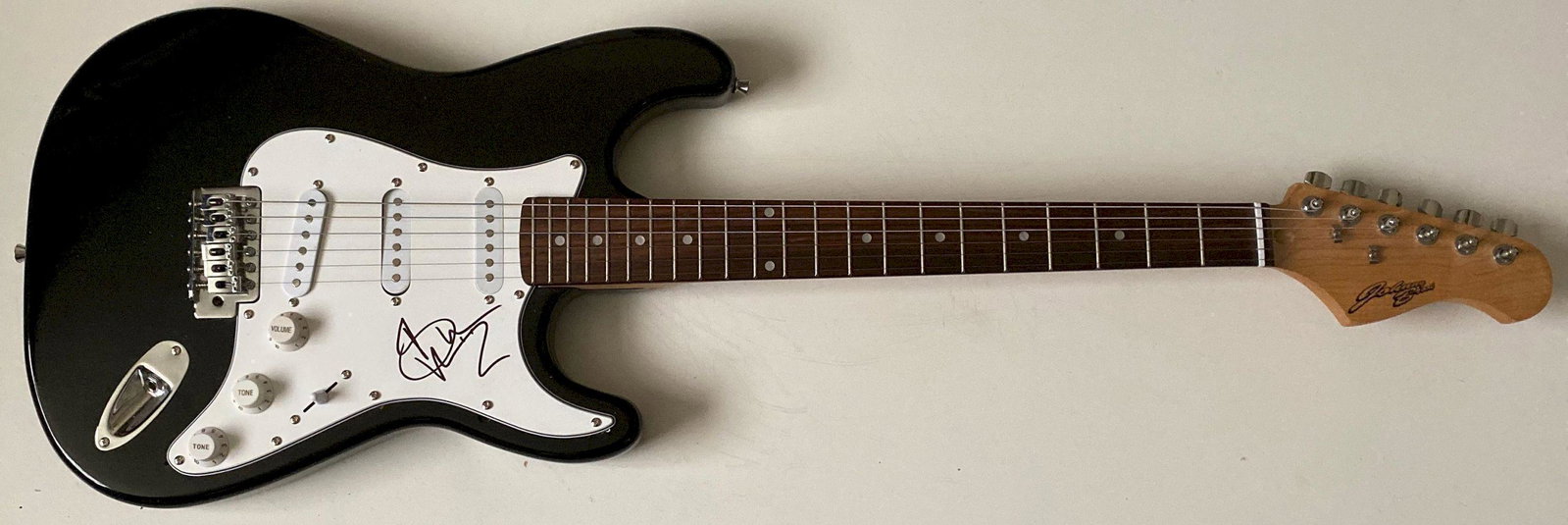 Bruce Dickinson Iron Maiden Signed Electric Guitar: This lot is an electric guitar autographed by Bruce Dickinson of Iron Maiden. Item comes with Certificate of Authenticity guaranteeing it for a lifetime