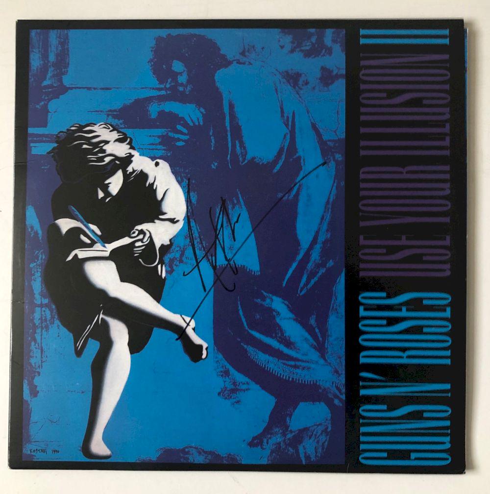Axl Rose Guns n Roses Signed Use Your Illusion 2 Vinyl: This lot is a vinyl LP autographed by Axl Rose of Guns n Roses. Item comes with Certificate of Authenticity guaranteeing it for a lifetime. Item comes with photos from exact time of signing. All items