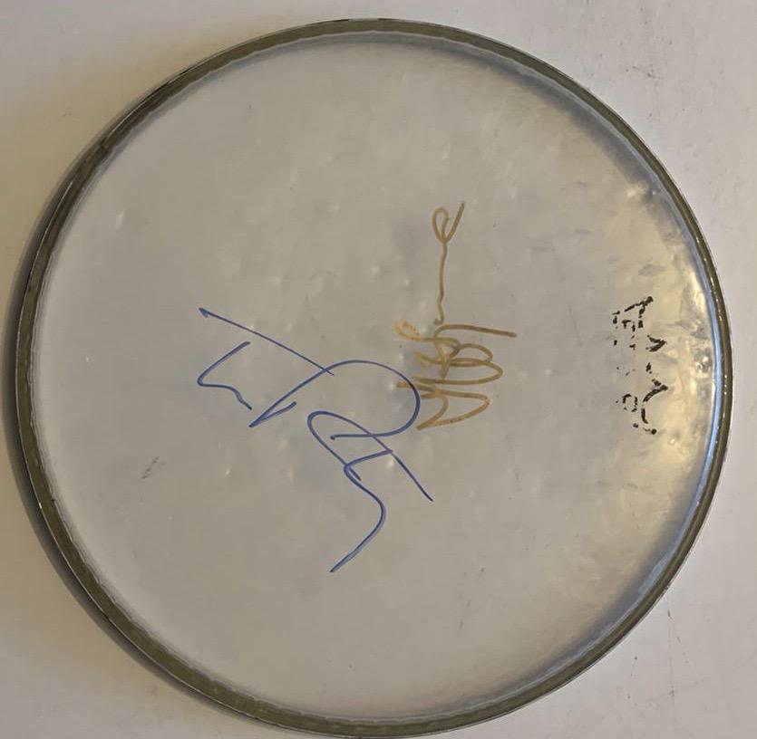 Tom Petty Jeff Lynne Signed Drumskin Certified: This lot is a Drumskin autographed by Tom Petty and Jeff Lynne. Item comes with Certificate of Authenticity guaranteeing it for a lifetime
