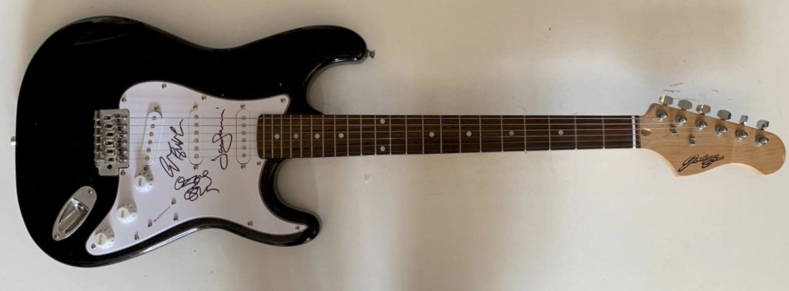Black Sabbath Ozzy Osbourne Signed Electric Guitar: This lot is an electric guitar autographed by Ozzy Osbourne, Geezer Butler and Tony Iommi of Black Sabbath. Item comes with Certificate of Authenticity guaranteeing it for a lifetime
