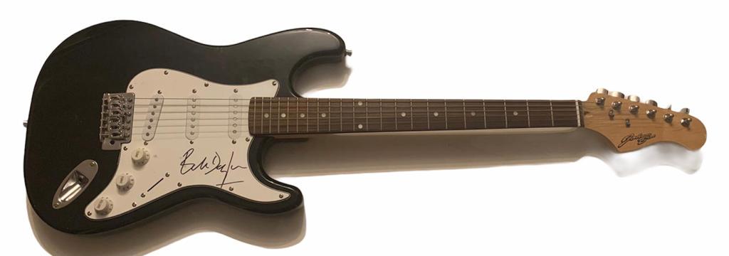 Bob Dylan Signed Electric Guitar Certified: This lot is an electric guitar autographed by Bob Dylan. Item comes with Certificate of Authenticity guaranteeing it for a lifetime