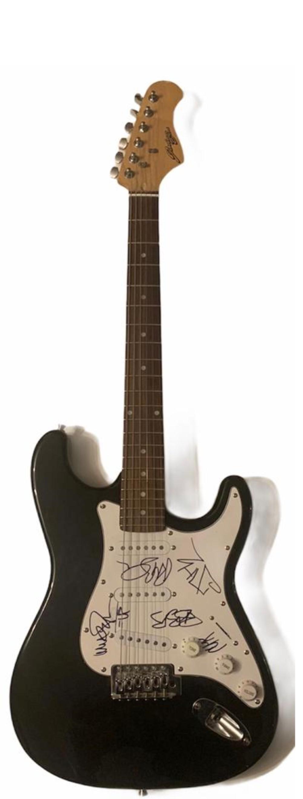 Linkin Park Signed Electric Guitar Certified: This lot is an electric guitar autographed by Chester Bennington, Mike Shinoda, John Hahn, Brad Delson, Dave Farrell and Rob Bourdon of Linkin Park. Item comes with Certificate of Authenticity guarant