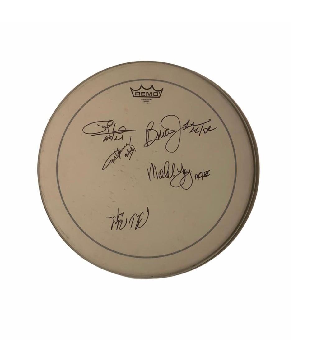 AC/DC Signed Drumskin Certified: This lot is a drumskin autographed by Brian Johnson, Angus Young, Malcolm Young, Cliff Williams and Phil Rudd of AC/DC. Item comes with Certificate of Authenticity guaranteeing it for a lifetime