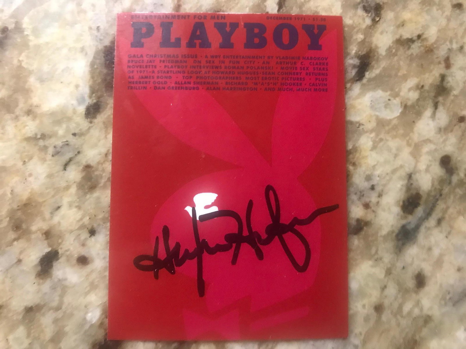 Hugh Hefner Signed Dec 1971 Playboy Card Certified: This lot is a December 1971 Playboy card, autographed by Hugh Hefner. Item comes with Certificate of Authenticity guaranteeing it for a lifetime.