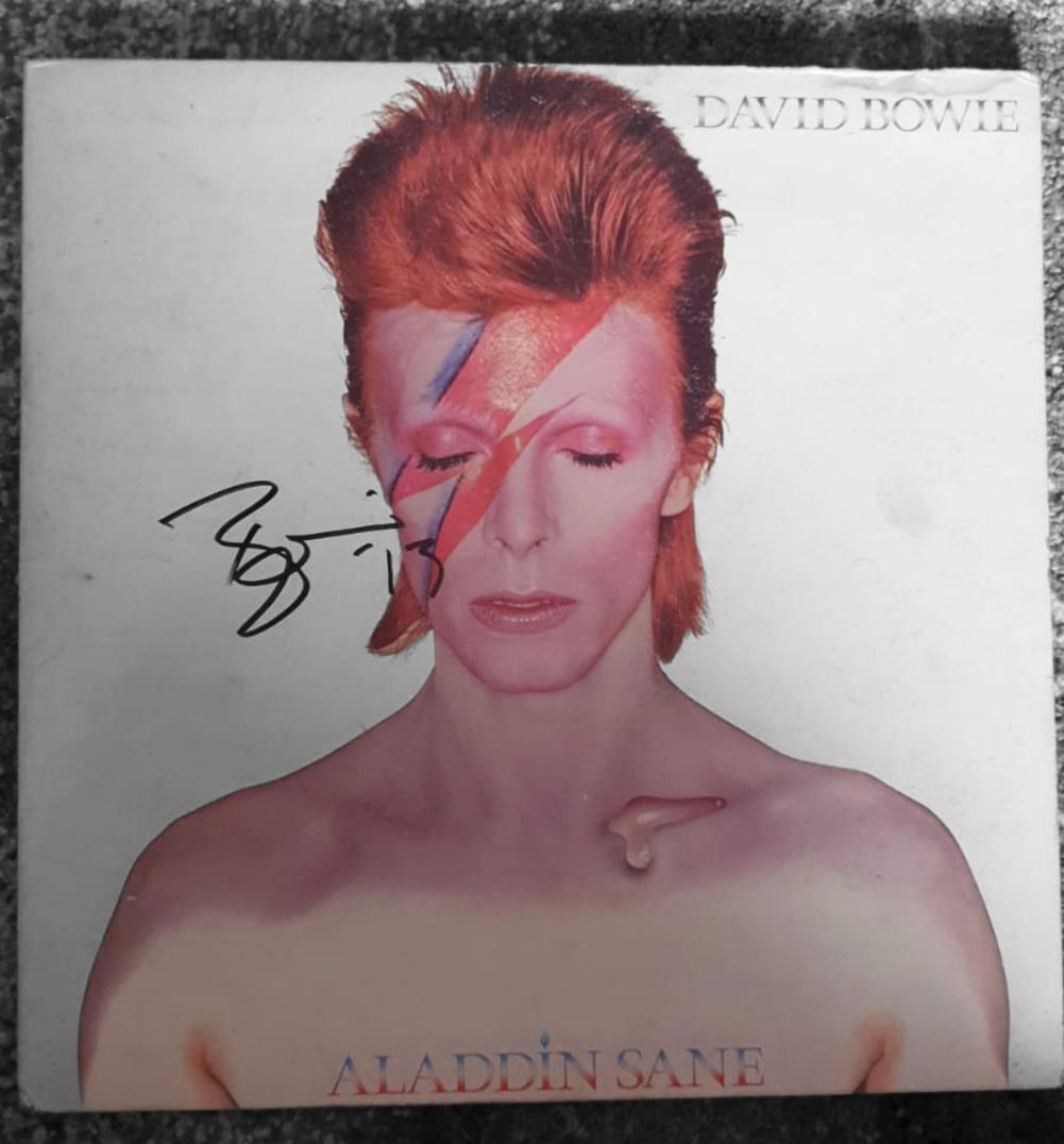 David Bowie Signed Aladdin Sane Vinyl LP Certified: This lot is an vinyl LP (Aladdin Sane) autographed by David Bowie. Item comes with Certificate of Authenticity, guaranteeing it for a lifetime.