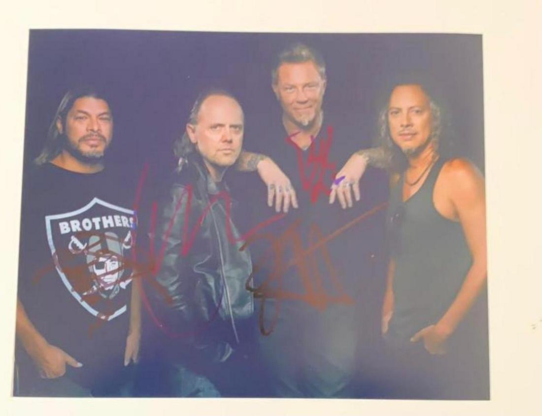 Metallica Signed Photograph Certified: This lot is a 10 x 8” photograph autographed by James Hetfield, Kirk Hammett, Lars Ulrich and Robert Trujillo of Metallica. Item comes with Certificate of Authenticity, guaranteeing it for a lif