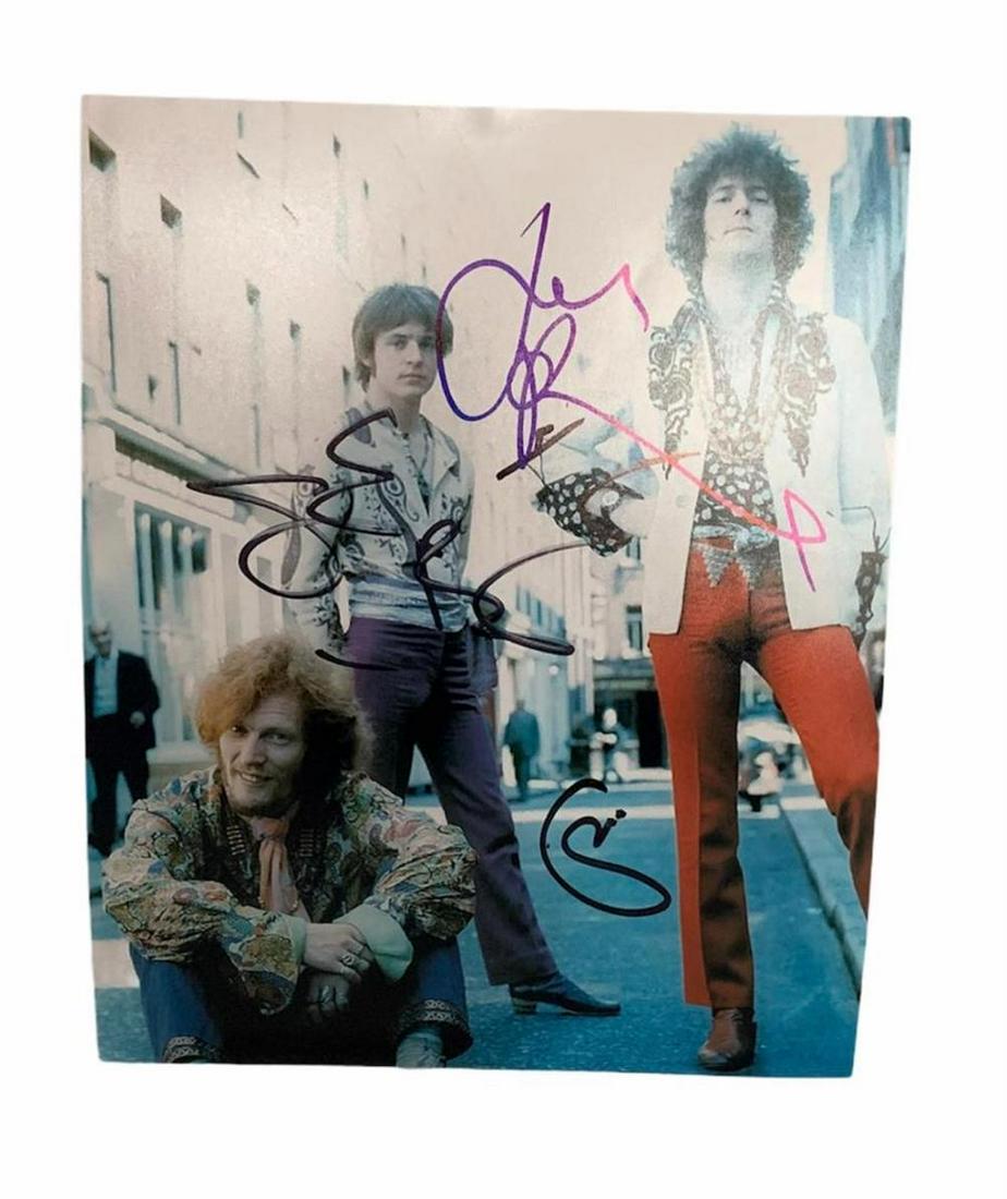 Cream Fully Signed Photograph Certified: This lot is a 10 x 8" photograph, autographed by Eric Clapton, Jack Bruce and Ginger Baker of Cream. Item comes with Certificate of Authenticity guaranteeing it for a lifetime