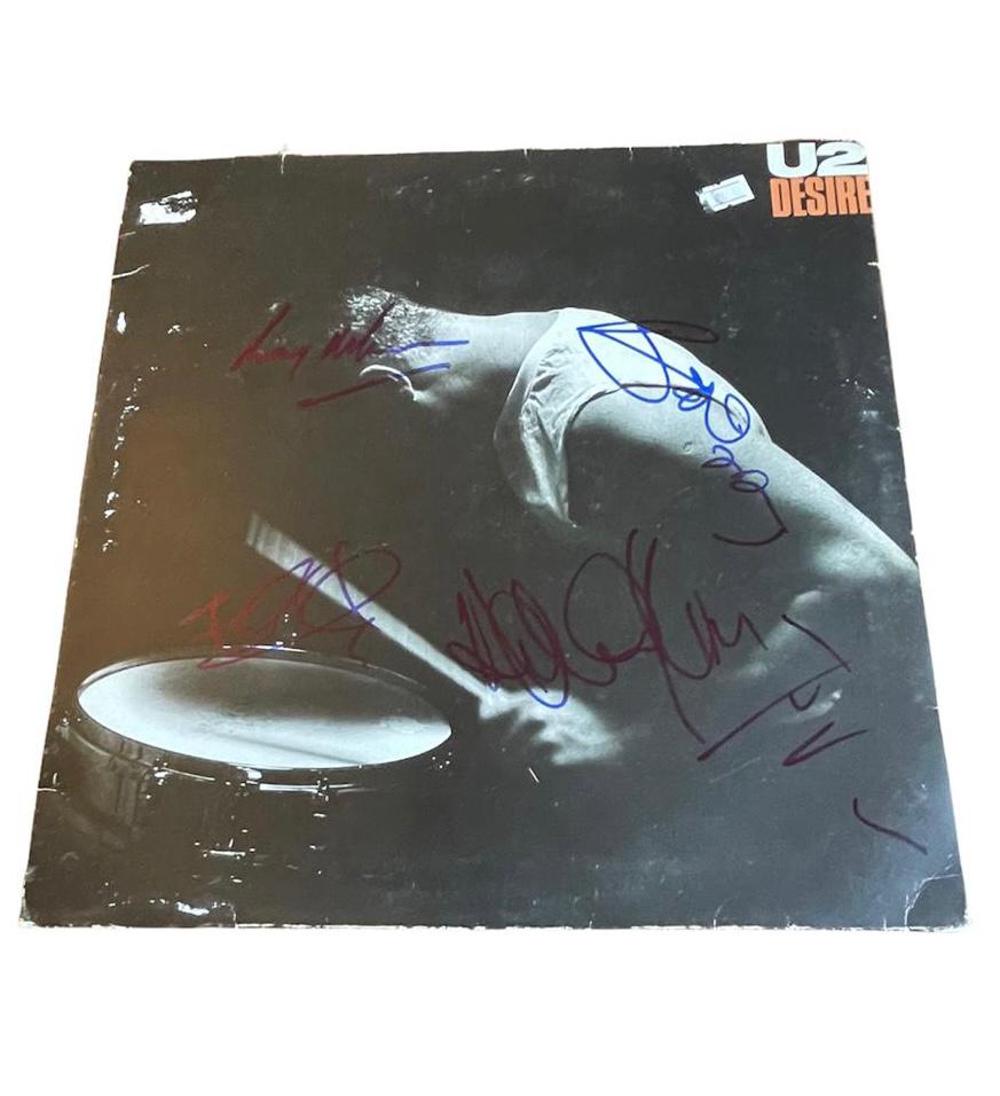 U2 Fully Signed Desire Vinyl LP Certified: This lot is a vinyl LP (Desire) autographed by Bono, The Edge, Larry Mullen Jr and Adam Clayton of U2. Item comes with Certificate of Authenticity, guaranteeing it for a lifetime.