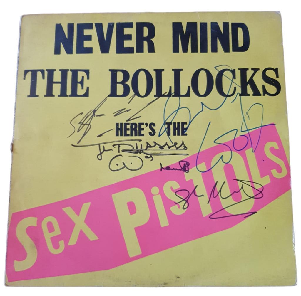 The Sex Pistols Fully Signed Never Mind The Bollocks Vinyl LP Certified: This lot is a vintage vinyl LP (Never Mind The Bollocks) autographed by Johnny Rotten, Steve Jones, Paul Cook and Glen Matlock of the Sex Pistols. Item comes with Certificate of Authenticity, guarante