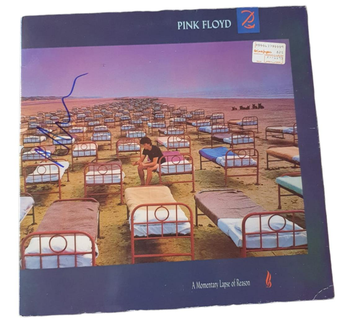 Pink Floyd A Momentary Lapse Of Reason Signed Vinyl LP Certified: This lot is a vinyl LP (A Momentary Lapse of Reason) autographed by Nick Mason of Pink Floyd. Item comes with Certificate of Authenticity, guaranteeing it for a lifetime.