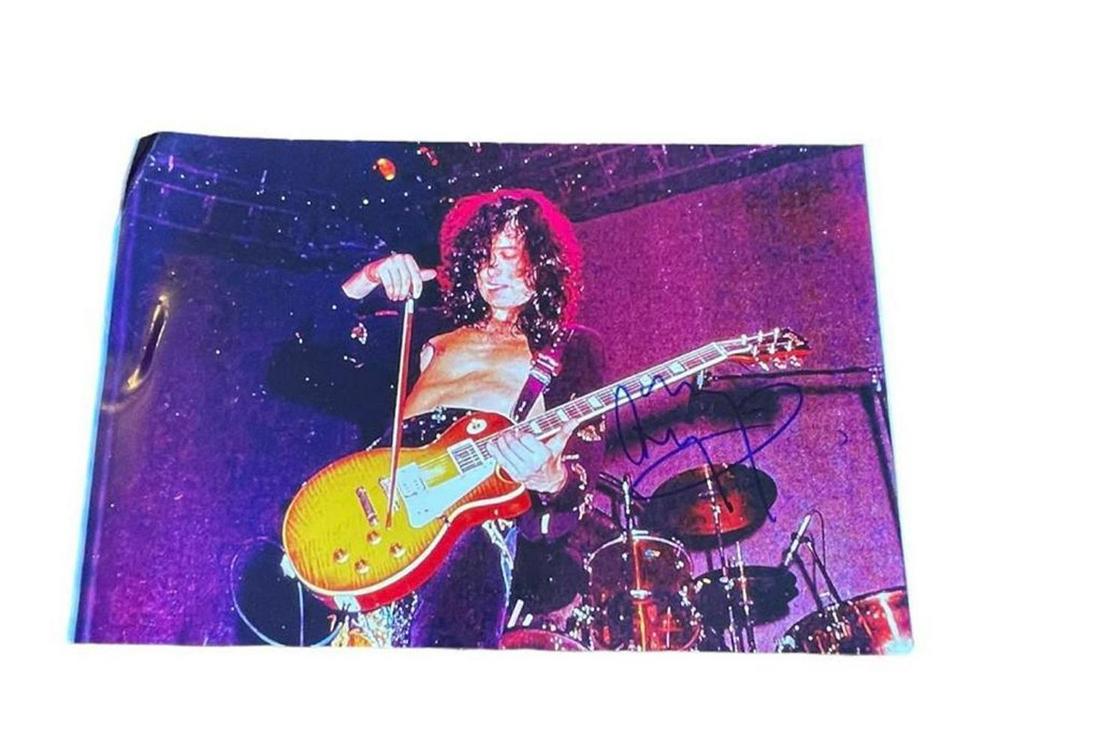 Jimmy Page Led Zeppelin Signed Photograph Certified: This lot is a 10 x 8” photograph autographed by Jimmy Page of Led Zeppelin. Item comes with Certificate of Authenticity, guaranteeing it for a lifetime.