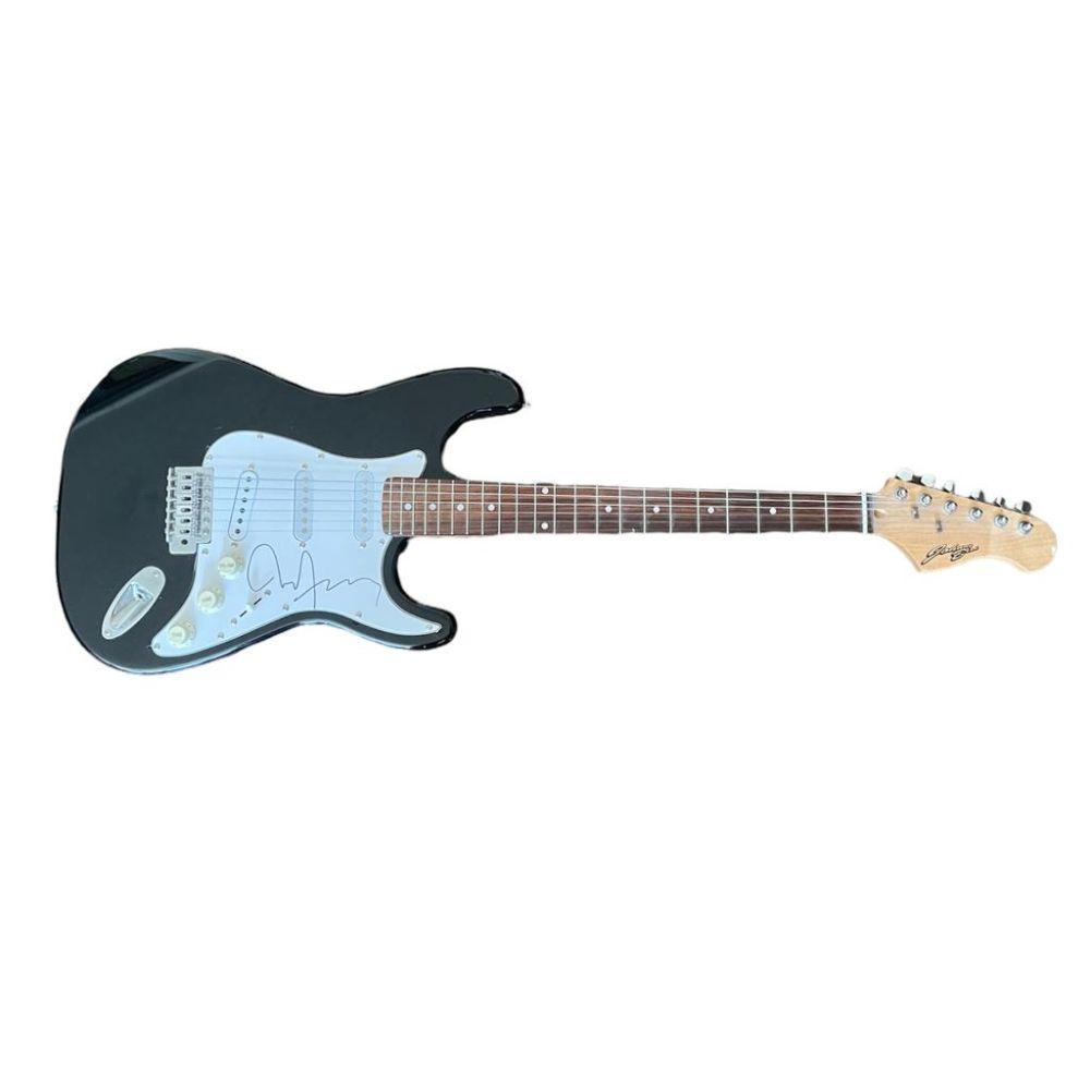 Bryan Ferry Roxy Music Signed Guitar Certified: This lot is an electric guitar autographed by Bryan Ferry of Roxy Music. Item comes with Certificate of Authenticity, guaranteeing it for a lifetime.