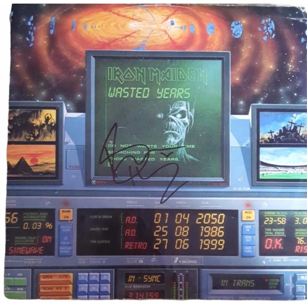Bruce Dickinson Signed Iron Maiden Wasted Years Vinyl LP Certified: This lot is a vinyl LP (Wasted Years) autographed by Bruce Dickinson of Iron Maiden. Item comes with Certificate of Authenticity, guaranteeing it for a lifetime.