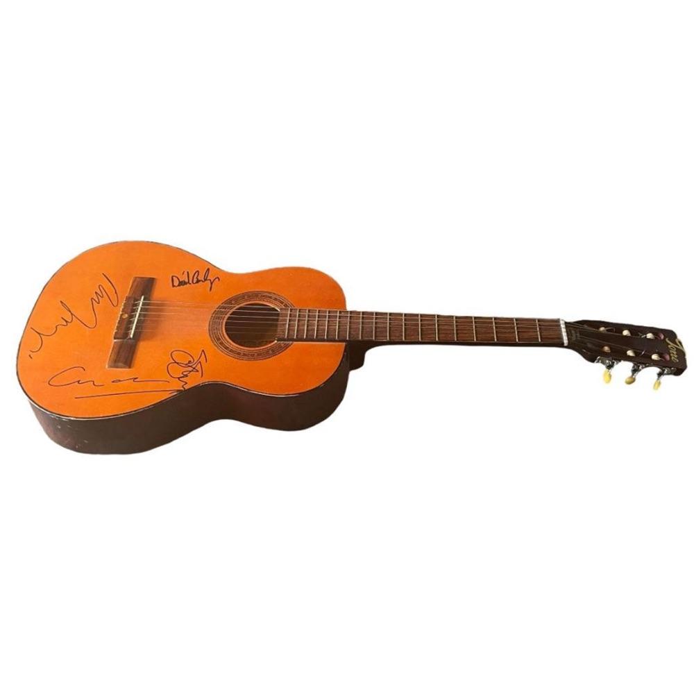 CSNY Signed Acoustic Guitar Certified: This lot is an acoustic guitar, autographed by David Crosby, Stephen Stills, Graham Nash and Neil Young of CSNY. Item comes with Certificate of Authenticity, guaranteeing it for a lifetime.
