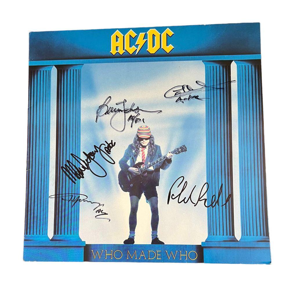 AC/DC Fully Signed Who Made Who Vinyl LP Certified: This lot is a vinyl LP 'Who Made Who' autographed by Brian Johnson, Cliff Williams, Malcolm Young, Angus Young and Phil Rudd of AC/DC. AC/DC are an Australian rock band, they have sold more than 200 m