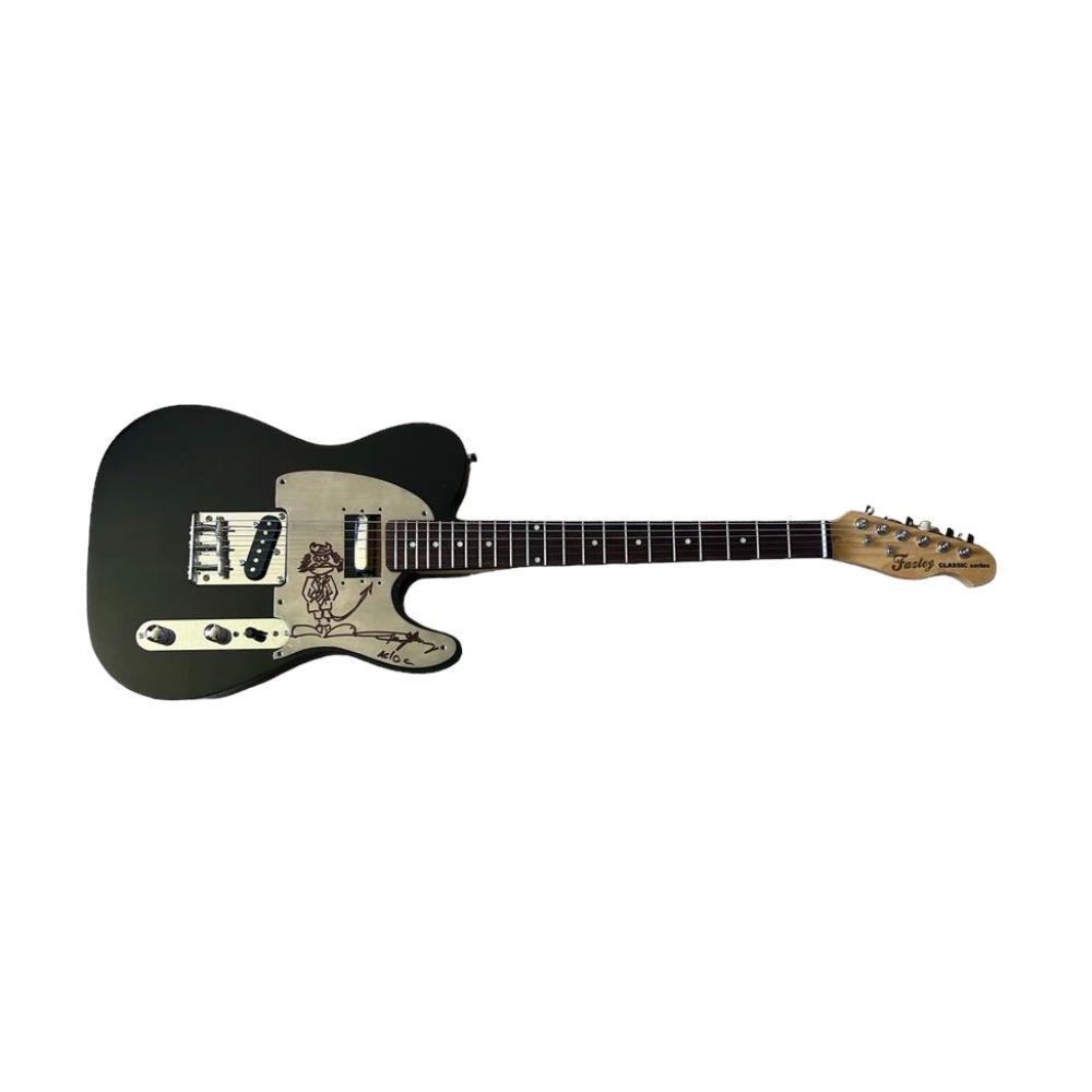 AC/DC Angus Young Signed Telecaster Electric Guitar Certified: This lot is a telecaster style electric guitar, featuring autograph and artwork on the metal pickguard by Angus Young of AC/DC. AC/DC are an Australian rock band, they have sold more than 200 million 