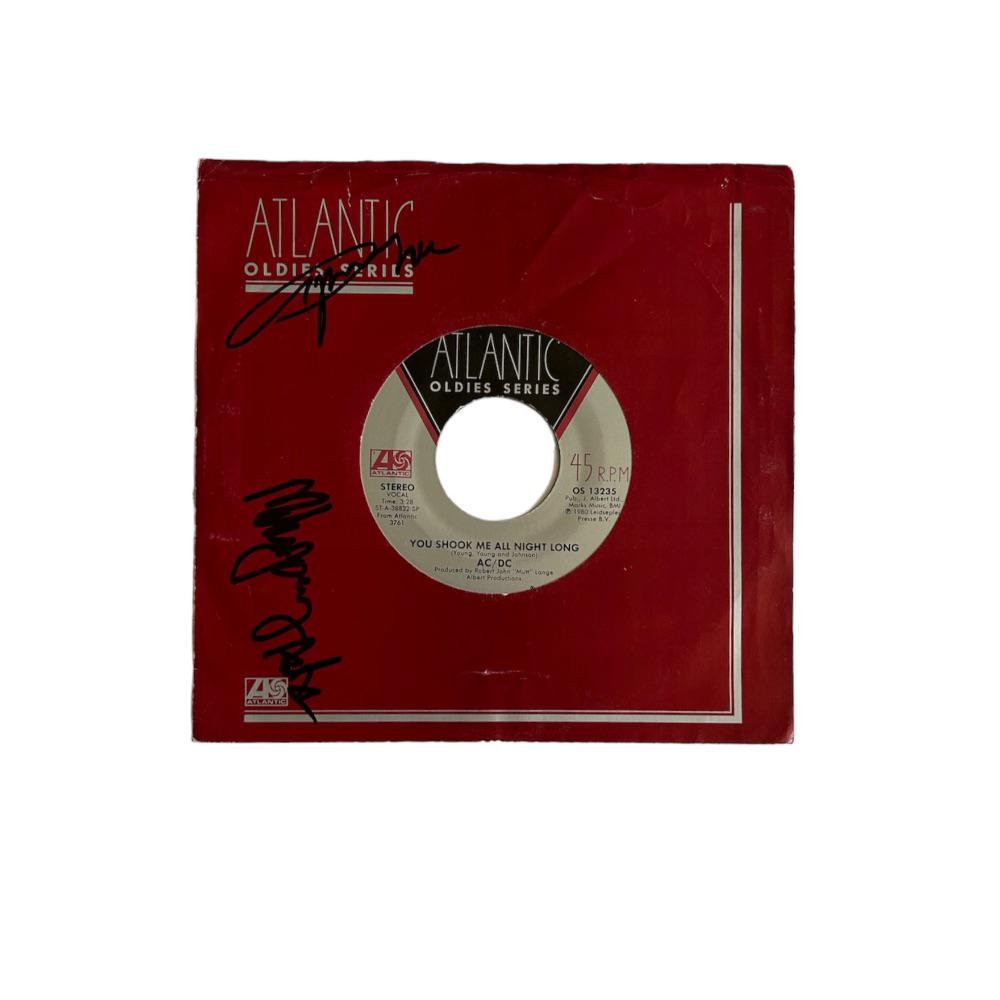 AC/DC Signed You Shook Me All Night Long Vinyl 45: This lot is a vinyl 45 (You Shook Me All Night Long) autographed by Angus Young and Malcolm Young of AC/DC. Item comes with Certificate of Authenticity. AC/DC are an Australian rock band, they have so