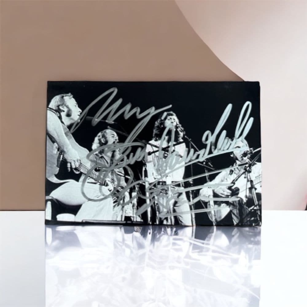CSNY 4 x 6" Photograph: This lot is a 4 x 6" photograph autographed by David Crosby, Stephen Stills, Graham Nash and Neil Young of CSNY. Crosby, Stills & Nash (CSN) was a folk rock supergroup made up of American singer-songw